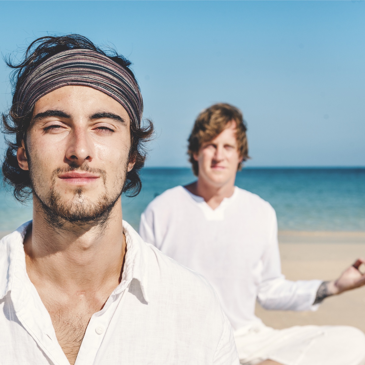beach-yoga-balance-calm-relaxing-exercise-concept-2021-08-27-00-01-38-utc